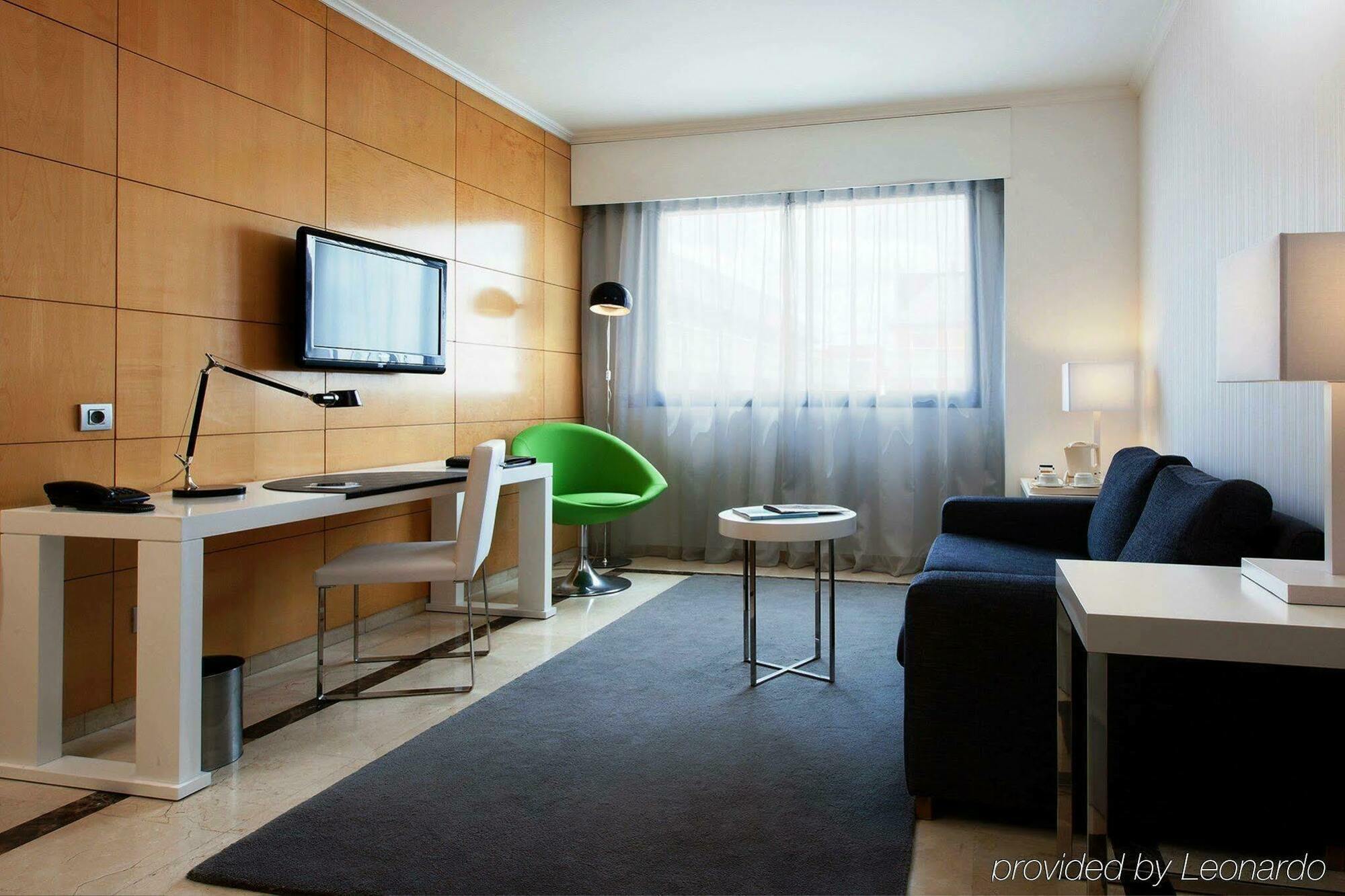 Nh Suites Prisma Madrid Habitación foto